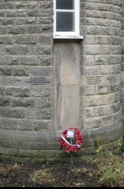 War memorial at what was Kent's Bank School. It is now the Social Services & Library.